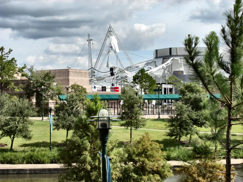 pavilion-ike-roof-frame-from-waterway-2008 The Pavilion roof frame stripped of fabric, seen across The Woodlands Waterway after Hurricane Ike