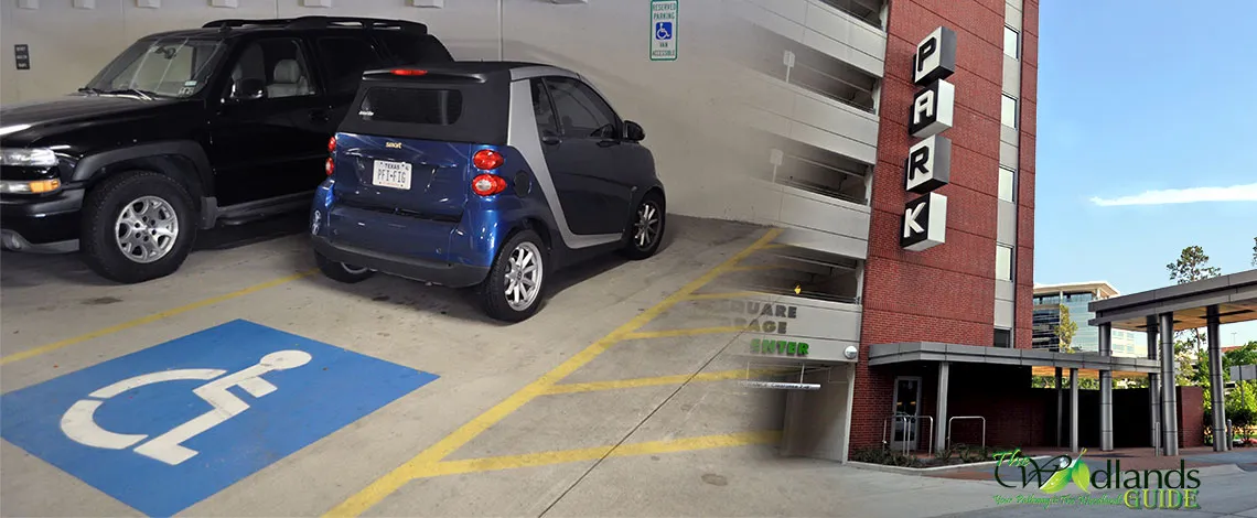 Pavilion parking: accessible space and Town Center garage Accessible parking space in a Town Center parking garage and a garage PARK sign in The Woodlands